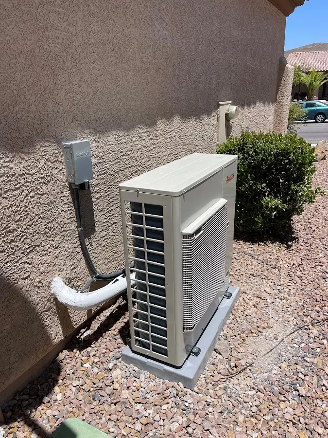 Residential air conditioning condenser unit in Forest